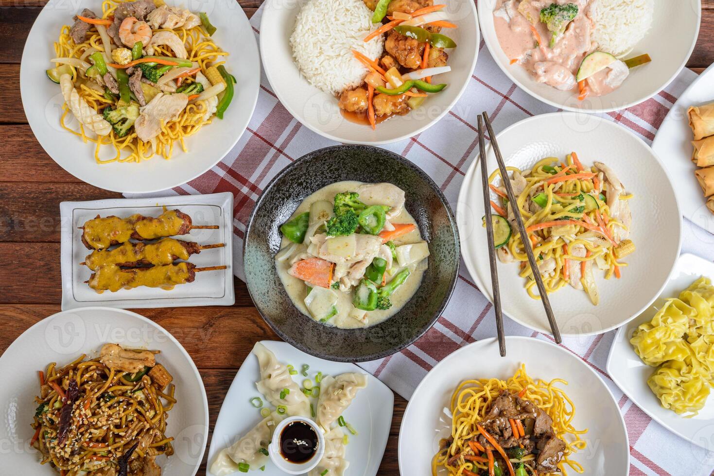 A table with many plates of food on it photo