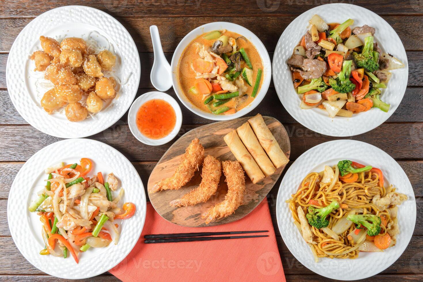 A table with several plates of food on it photo
