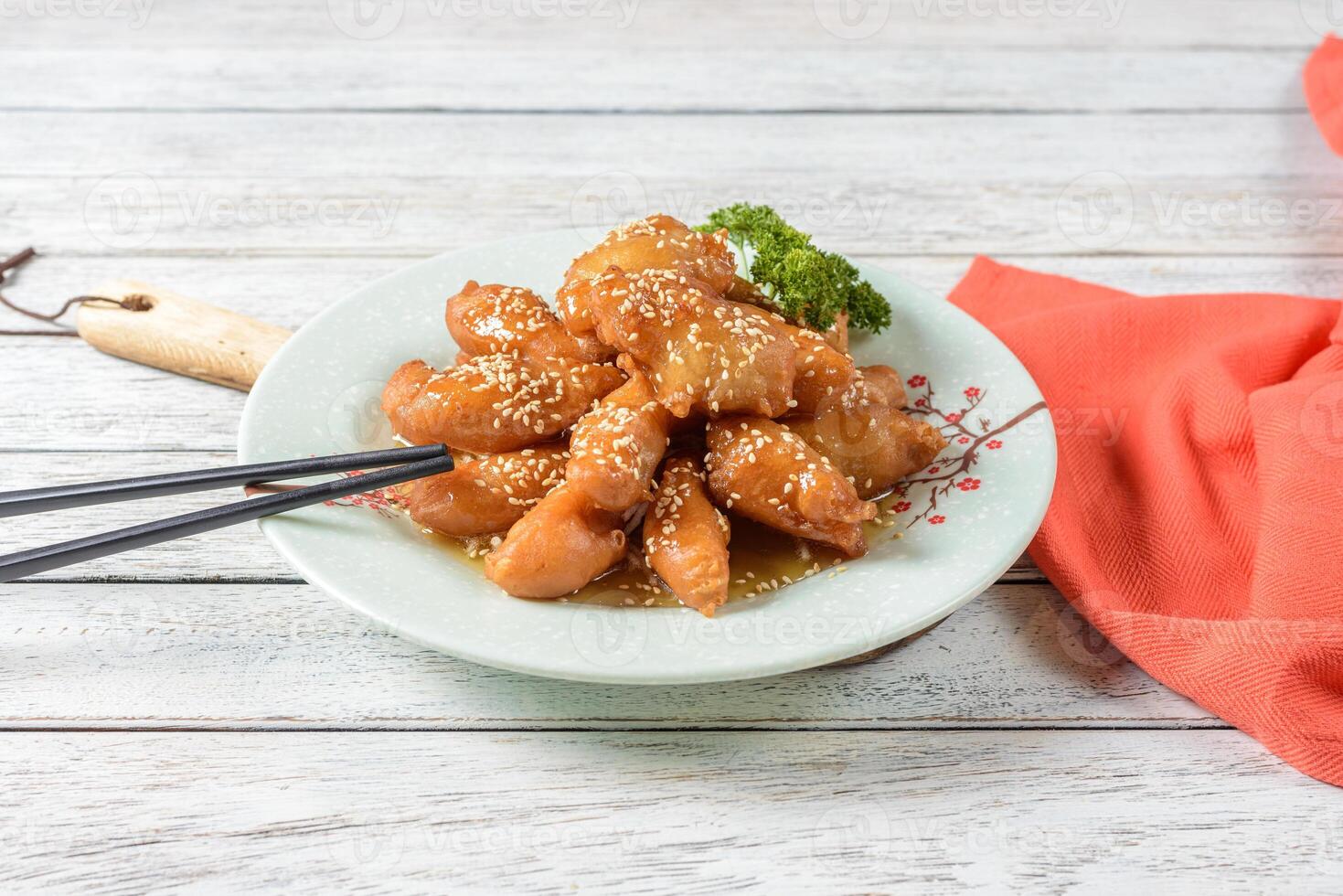 A plate of food with chopsticks on it photo