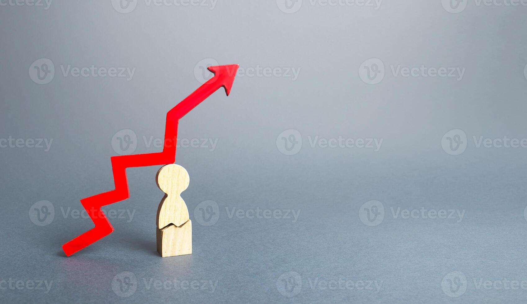 Figurine man with a crack and a red down arrow up. The growth of seriously ill people, critical cases of viral diseases. Severe complication for patients, inability to completely recover from disease. photo