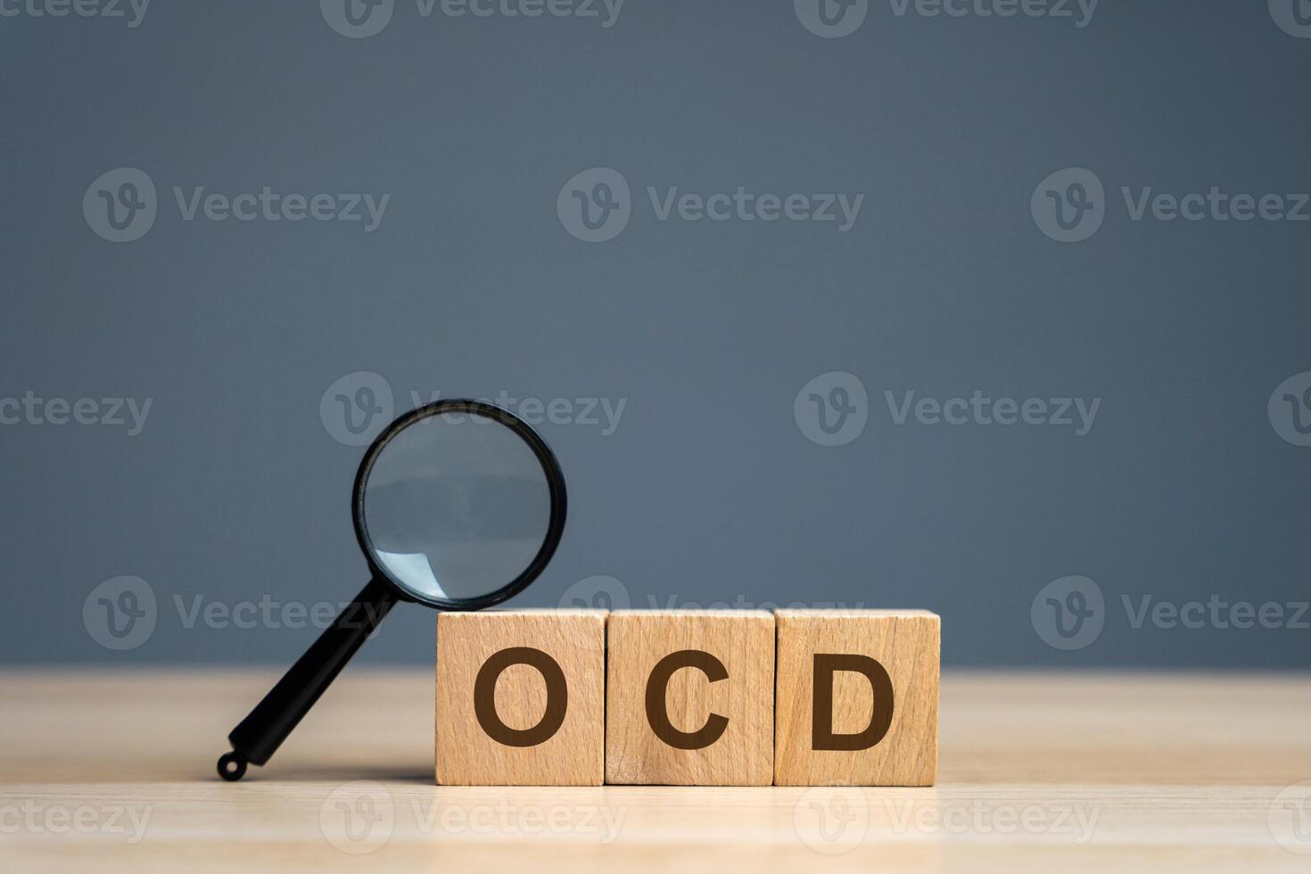 Wooden blocks with the abbreviation OCD. Obsessive compulsive disease. Mental health and psychiatry concept photo