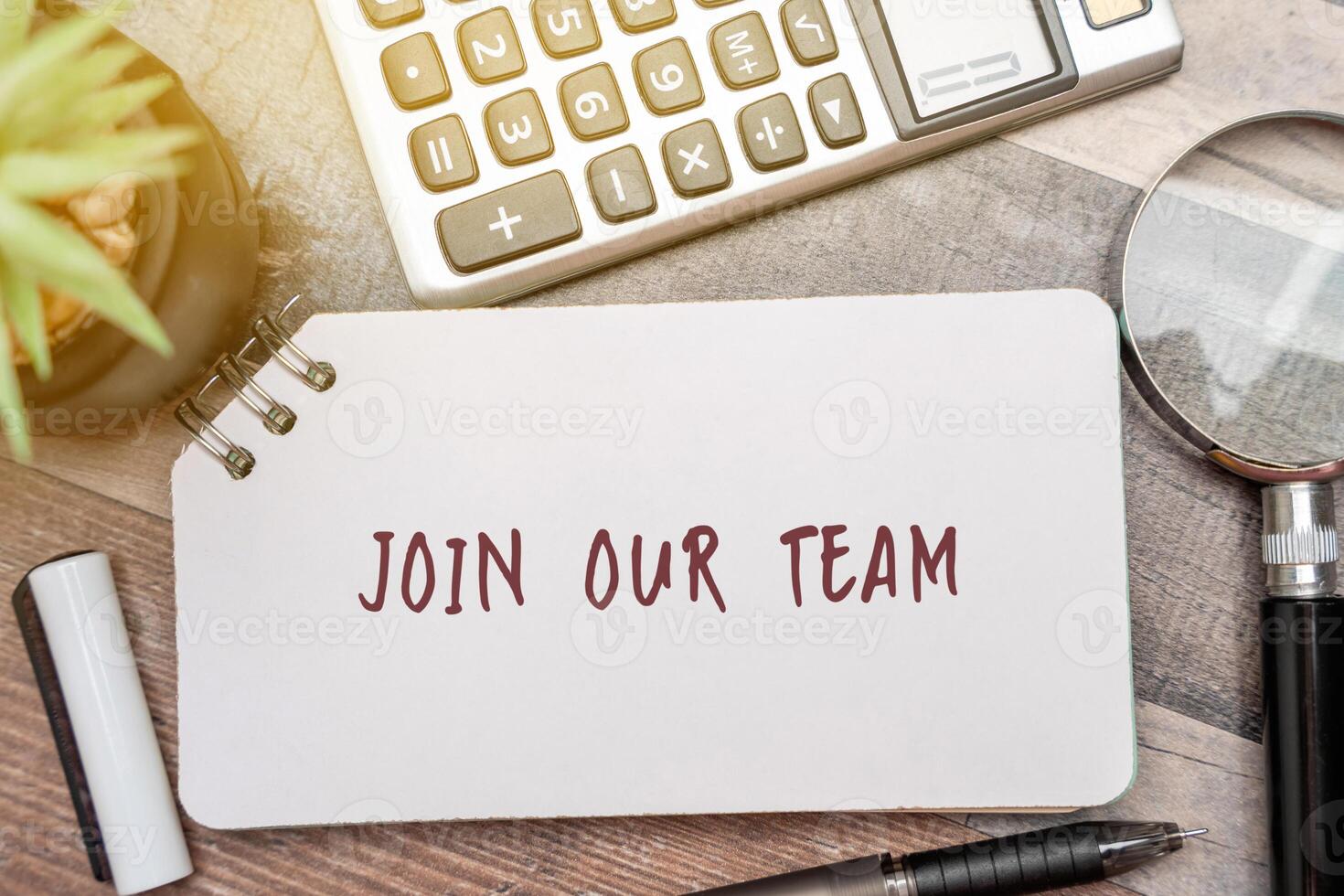 Notebook with word Join our team. Invitation for individuals to become part of an organization or group. Prospective employees to apply for open positions. Business concept photo