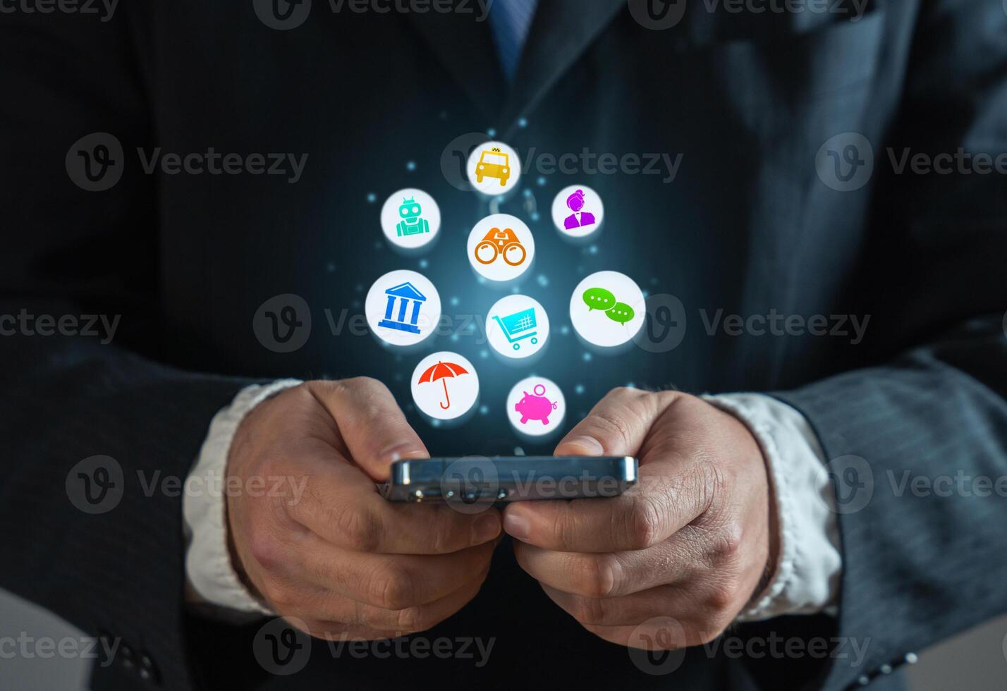 Businessman with a phone and a cloud of various services and mobile applications. Online business promotion and new experience for new customers users. An application that saves time and money. photo