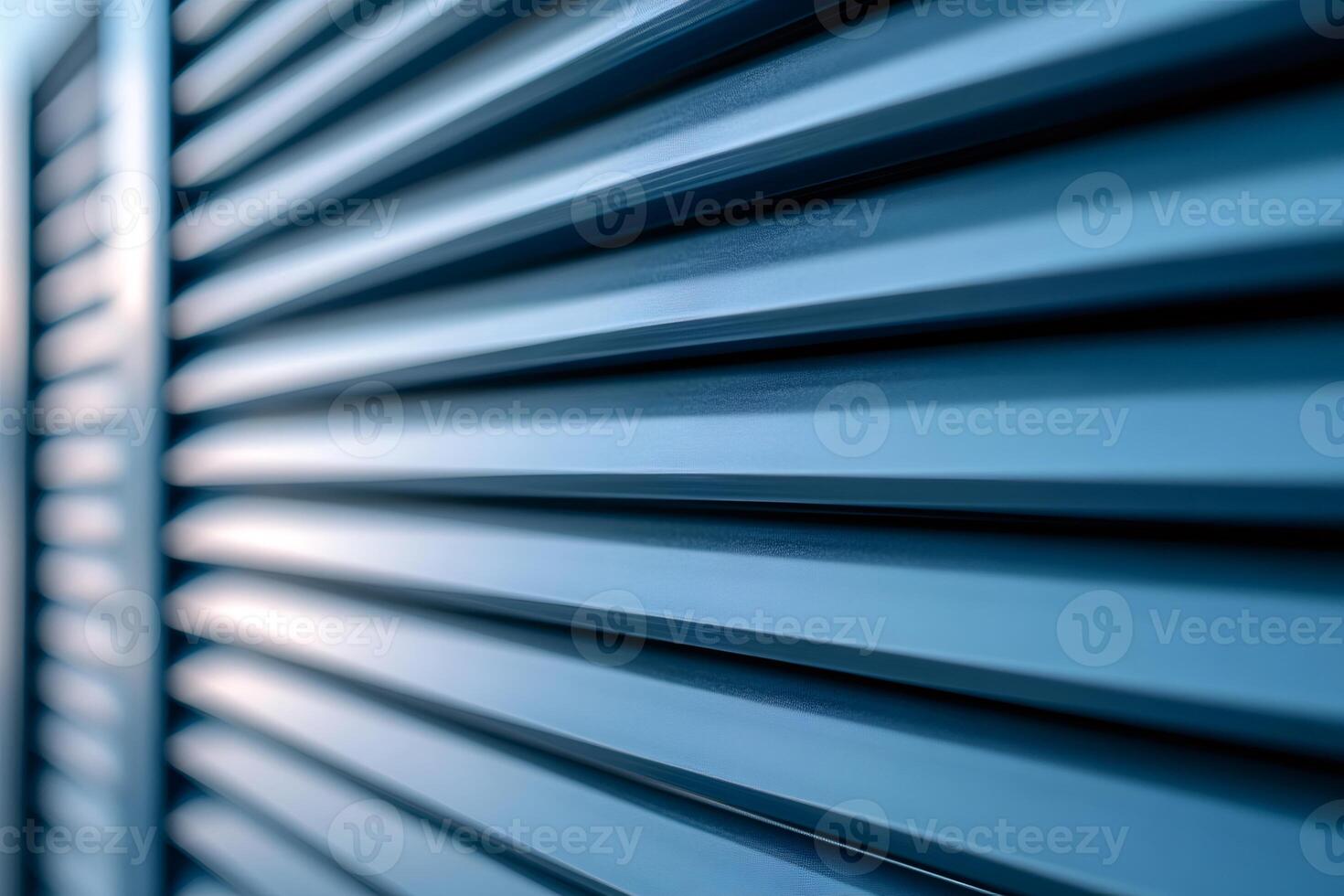Close-up of blue metal industrial ventilation grille creating repeating pattern photo