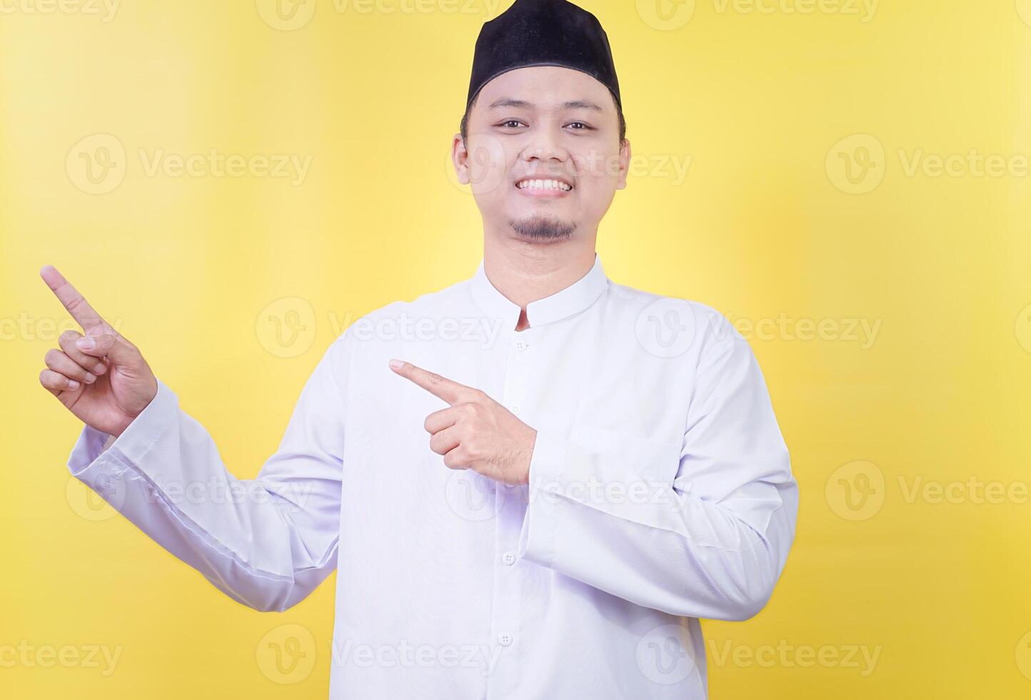 an Asian muslim man smiling and pointing to the left side photo