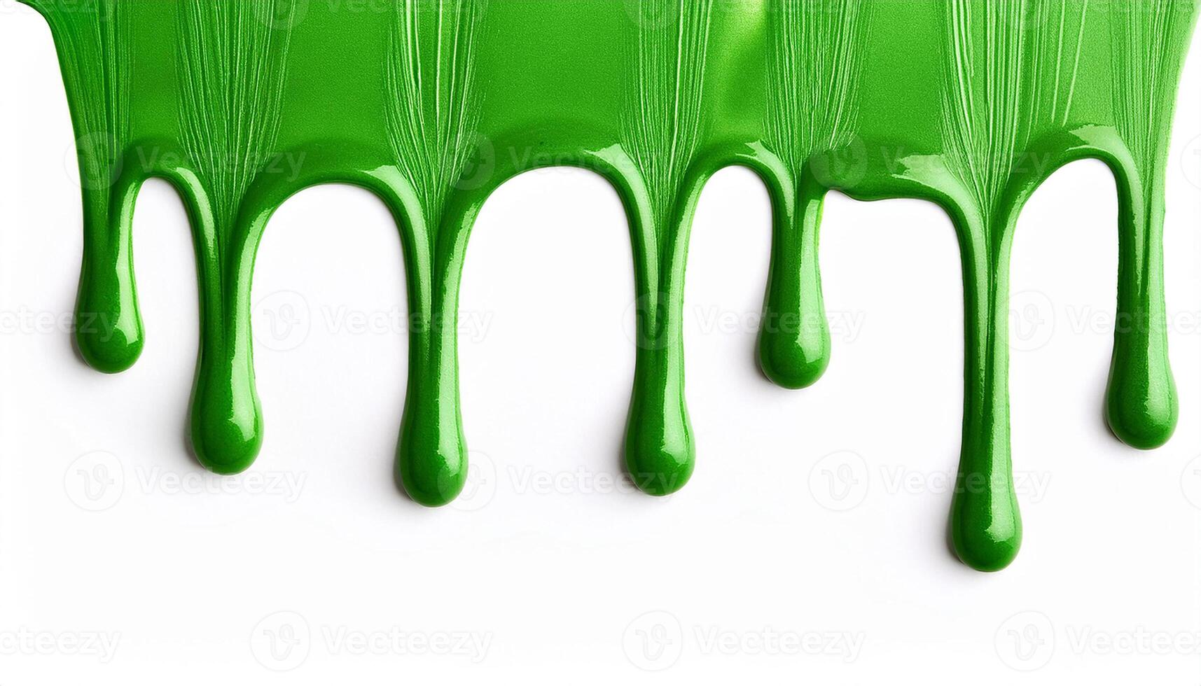 Vibrant green paint dripping on white background. Fresh bright paint flowing down. Abstract pattern. photo