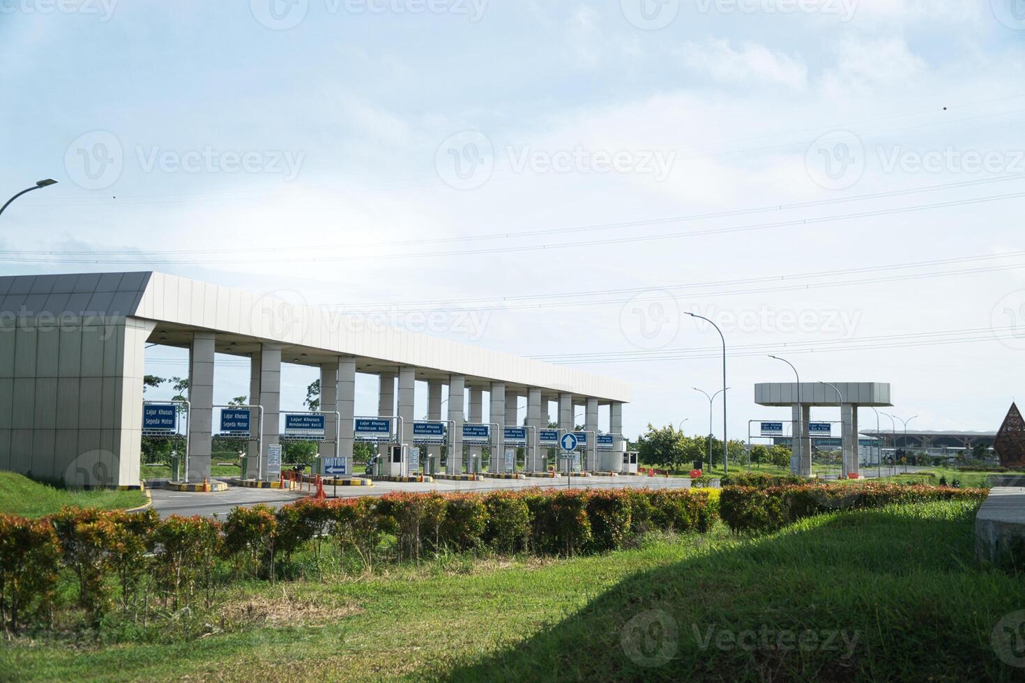 Modern Toll Plaza Architecture on a Sunny Day with Clear Sky photo