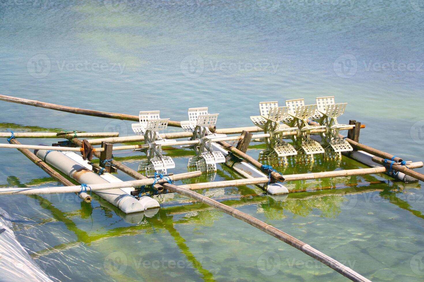 Aeration Paddle Wheels in Aquaculture Pond for Oxygenation photo