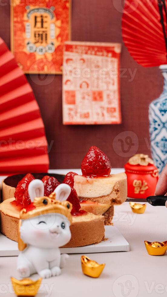 Chinese New Year Food with Chinese Ornaments and Cat Character and Chinese Poster Background. photo