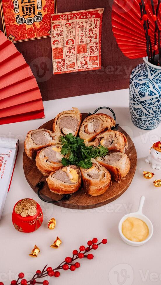 Top View of Chinese New Year Food with Chinese Ornaments Background. photo