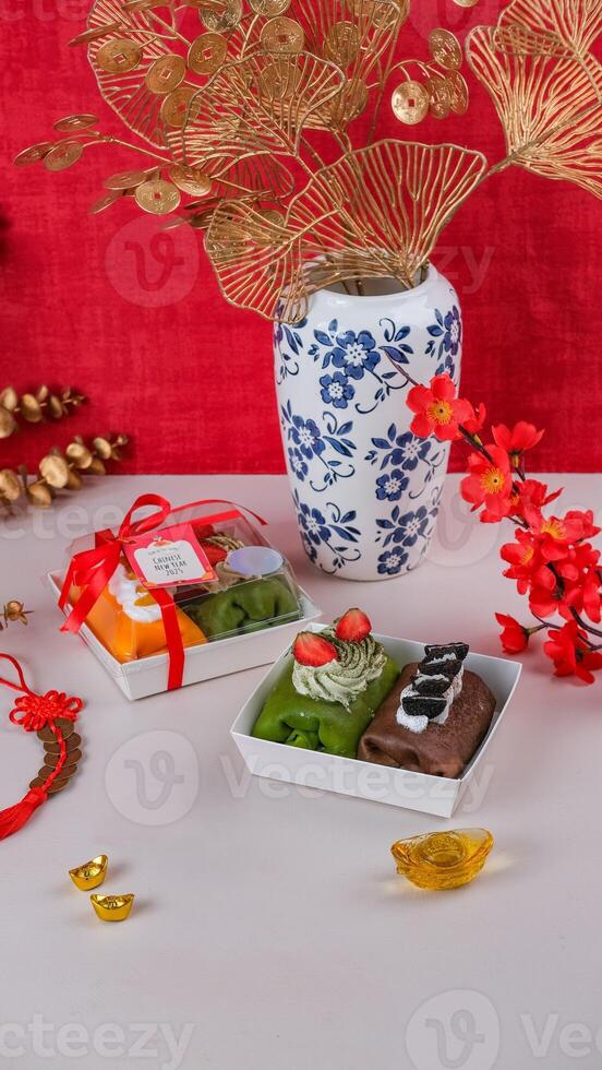 Chinese New Year Towels Cakes with Chinese Ornaments Background photo