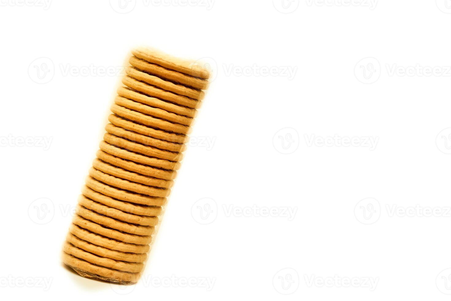 Sweet cookies in a protective cellophane package for sale on a white photo