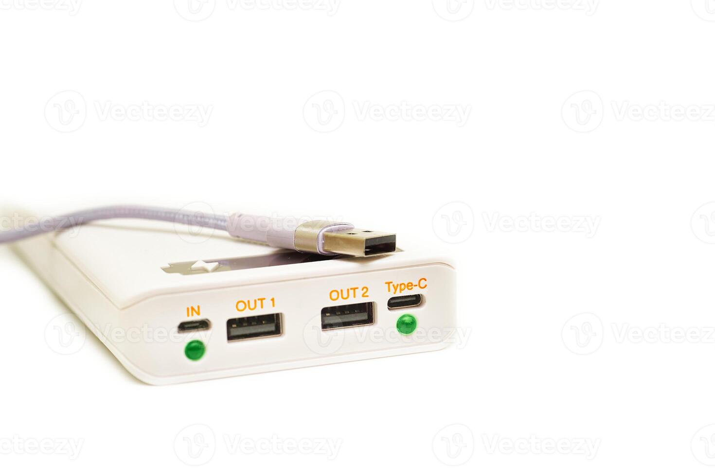 White power bank, usb cable for charging various gadgets, phones photo