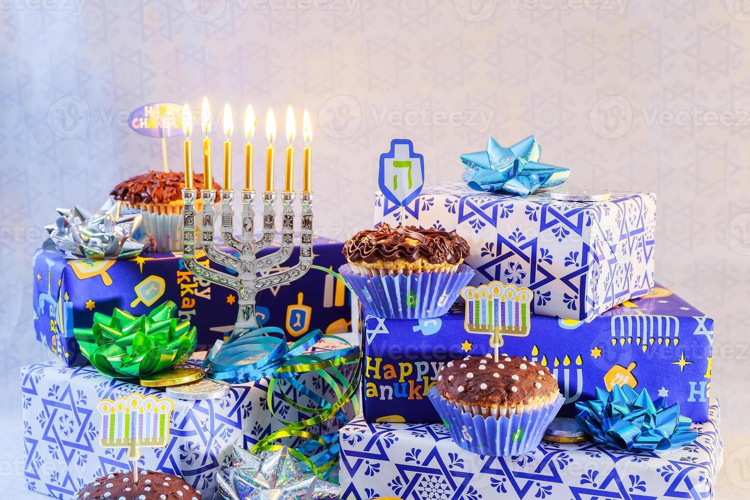 Jewish holiday jewish holiday Hanukkah with menorah traditional Candelabra and wooden dreidels spinning top photo