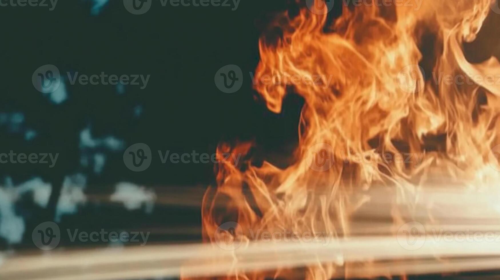 Close-Up of Fire Flames with Dark Background photo