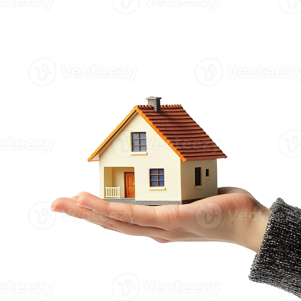 Hand holding model house presenting for home loan campaign on transparent background. Real estate concept. png