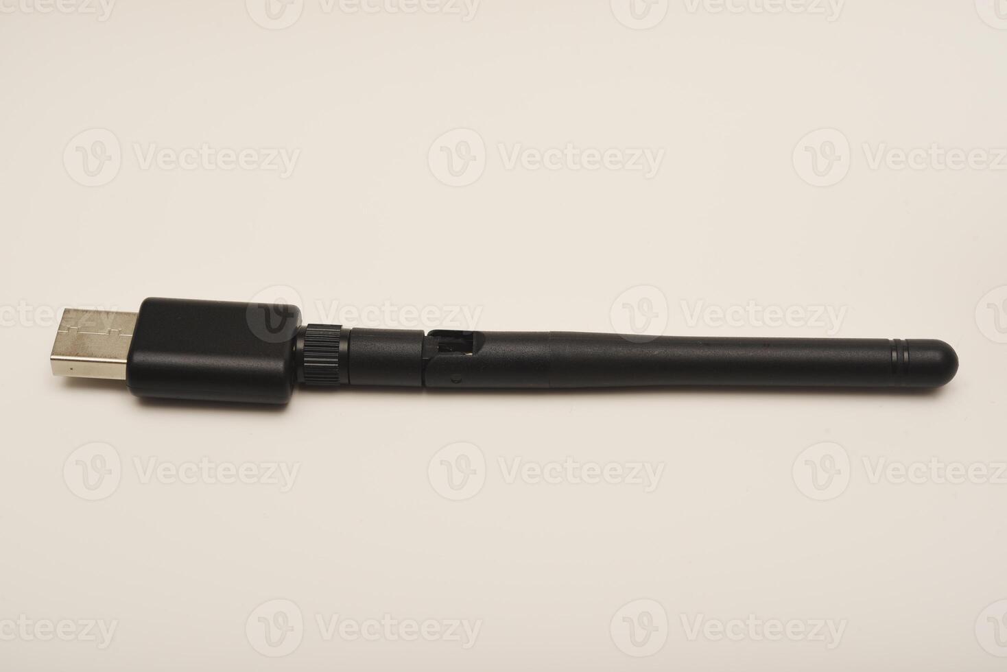 USB Bluetooth Adapter for PC. Wi-Fi router on a white background. photo