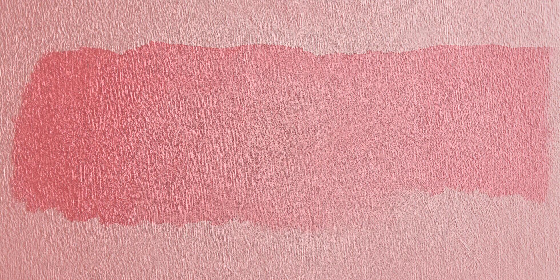 pink paint on a wall with a white background photo