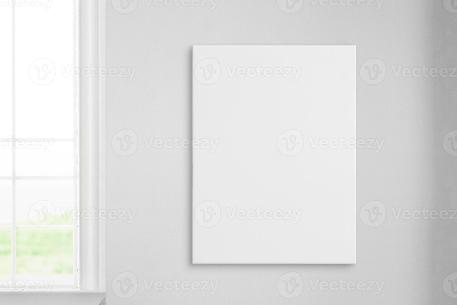 Vertical art canvas on wall beside a window. Clean surface ideal for mockup art presentation. Perfect for showcasing artwork photo