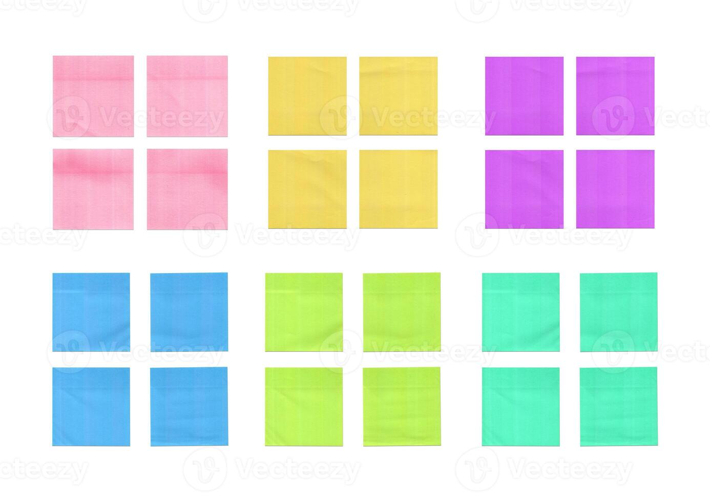 Close-up of colorful blank adhesive notes on white background photo