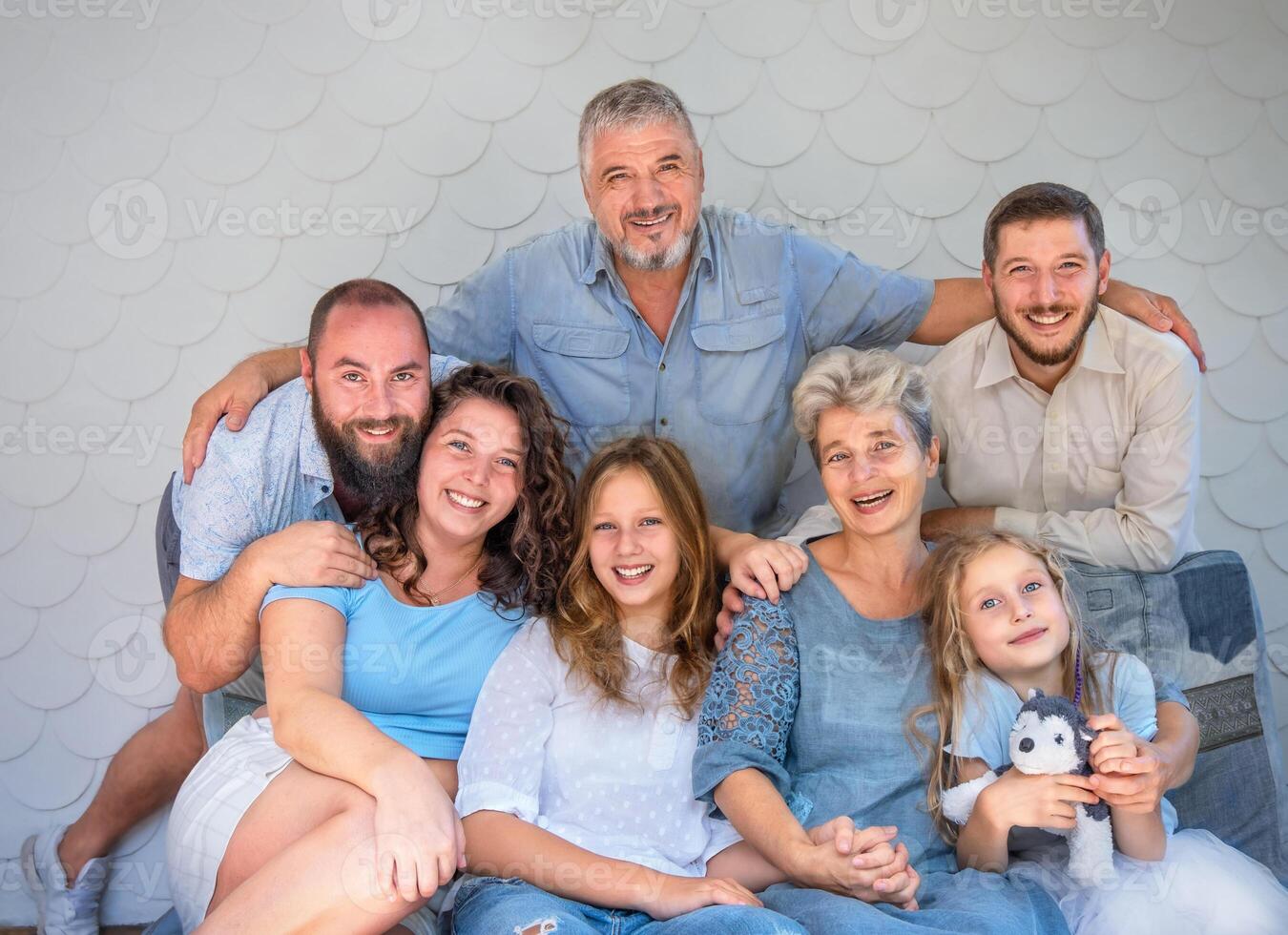 Portrait of the family on the sofa photo