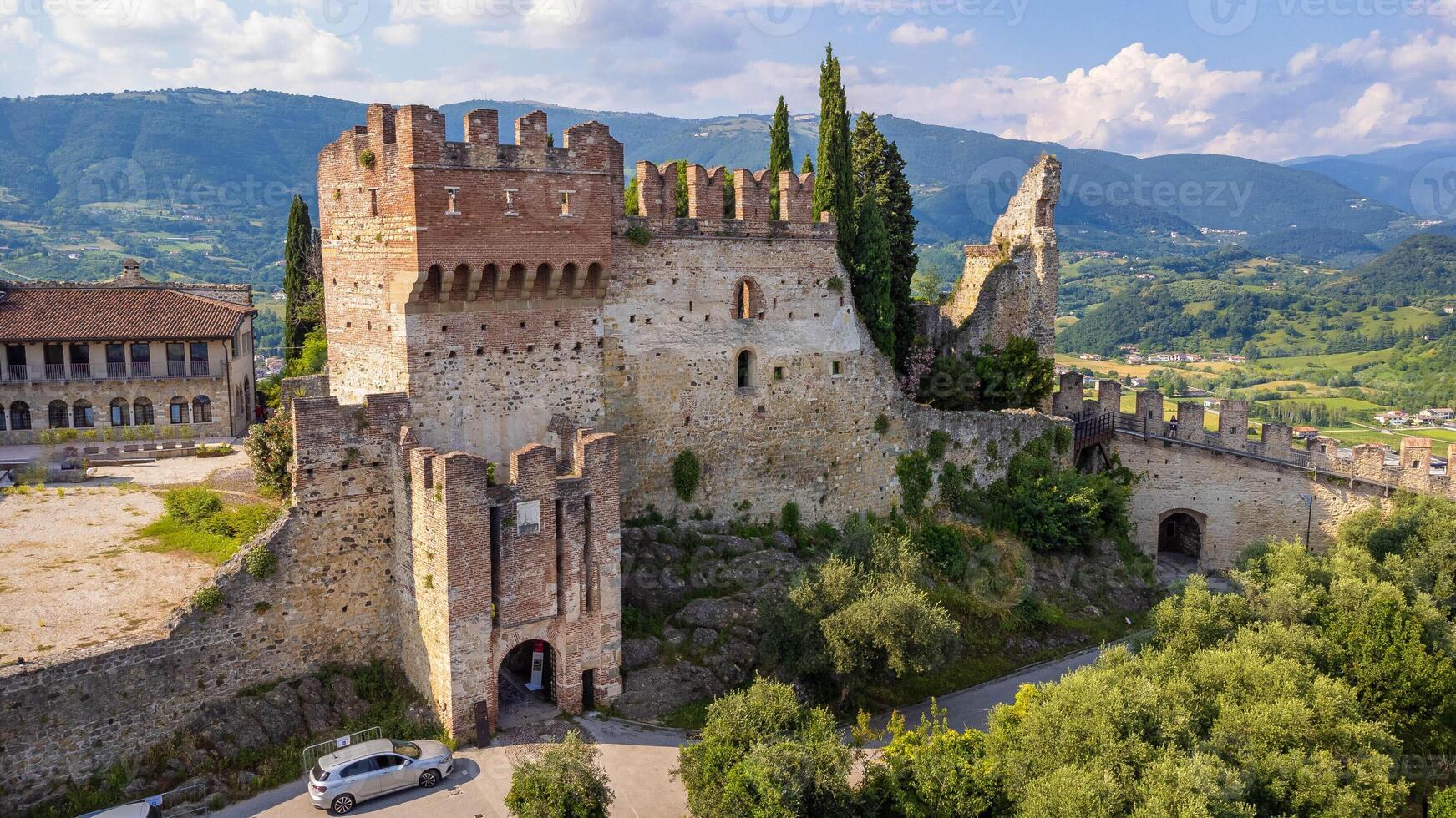 Marostica Upper Castle, aerial view of the medieval village on top of the mountain with surrounding walls. photo