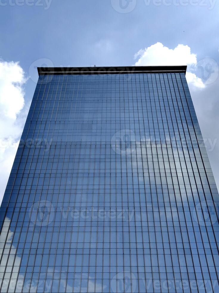 high office building in blue sky. photo
