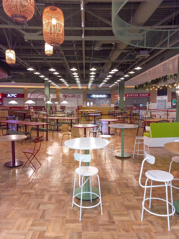 Moscow, Russia - September, 27, 2023 Restrictive measures on coronavirus in Russia. Quarantined cafe area in the shopping center. Vertical view. photo