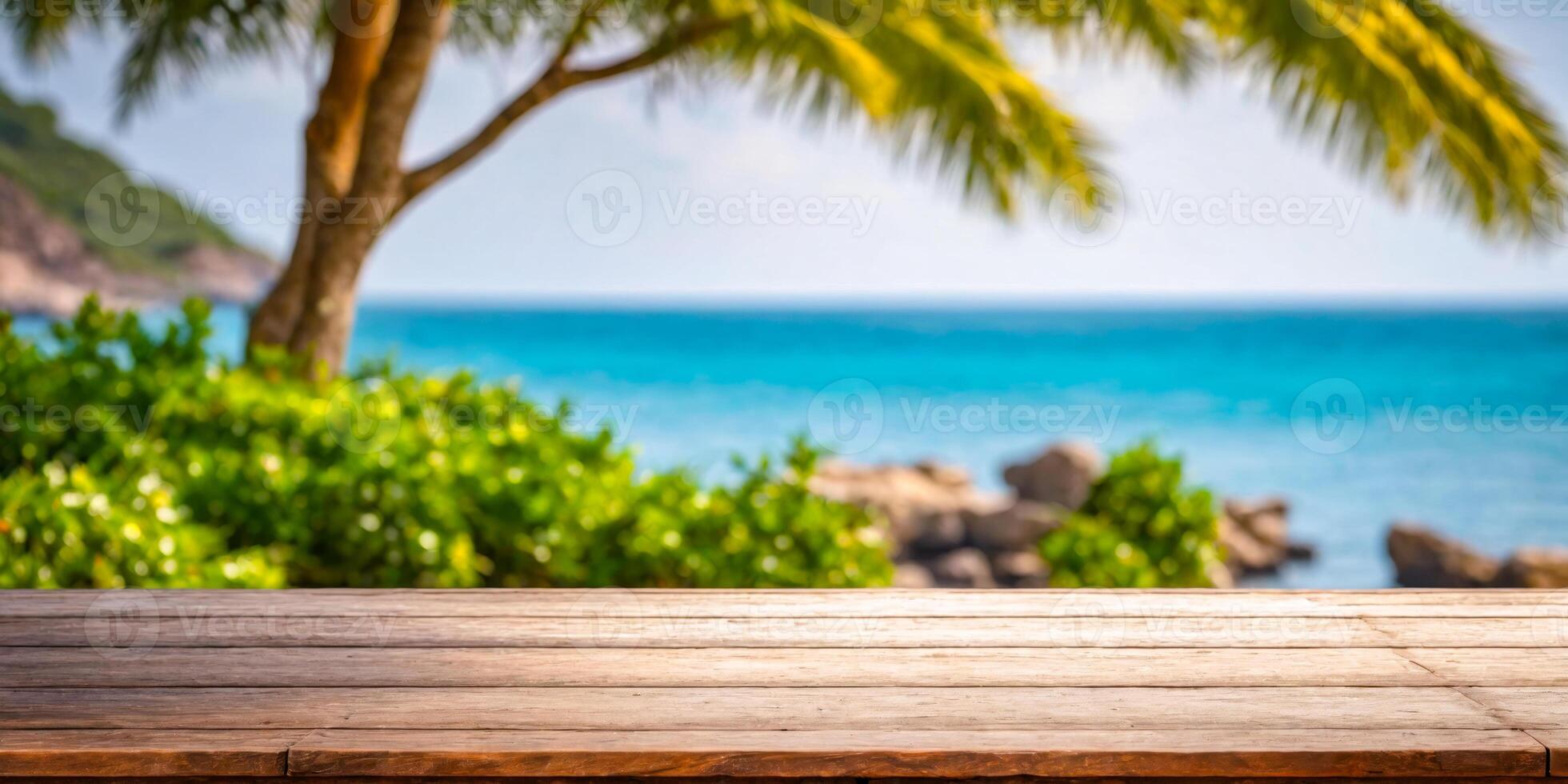 Wooden Table Over Blurred Tropical Beach Background photo