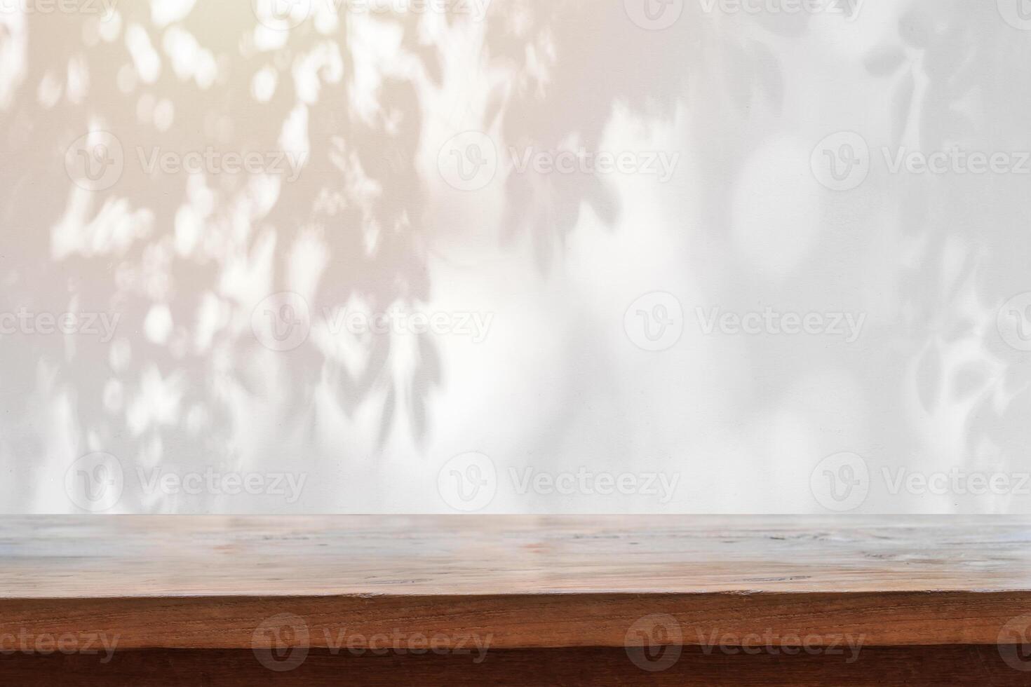 Abstract black and white Shadow of leaves background and textured with empty table top photo
