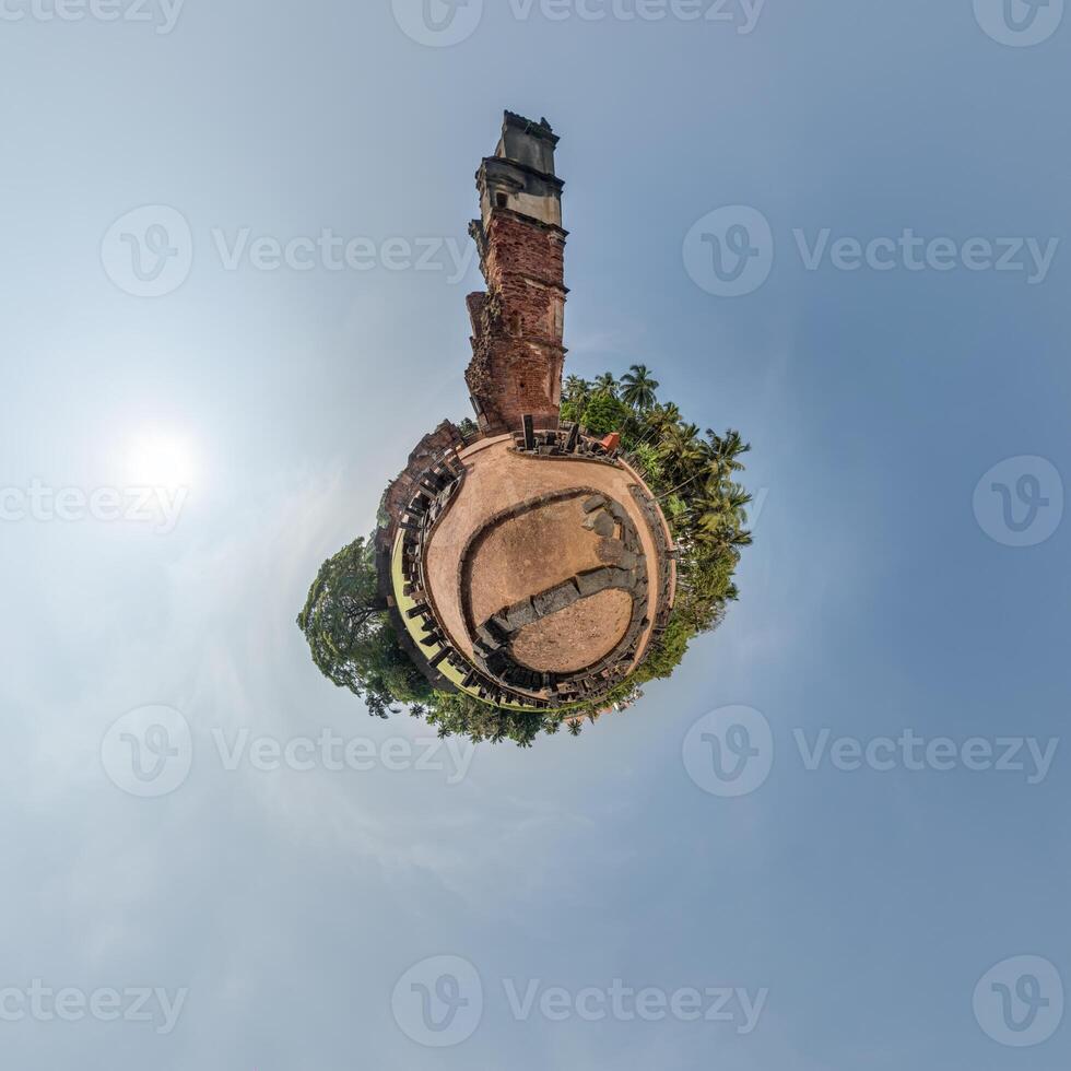 A small planet with a clock tower in the middle photo