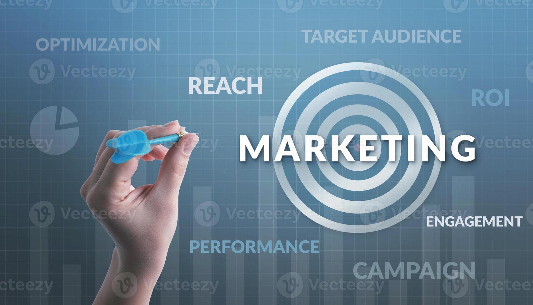 Hand aiming at a target labeled 'Marketing,' surrounded by words like target audience, reach, campaign, ROI, performance, and optimization, symbolizing strategic and precise marketing efforts photo