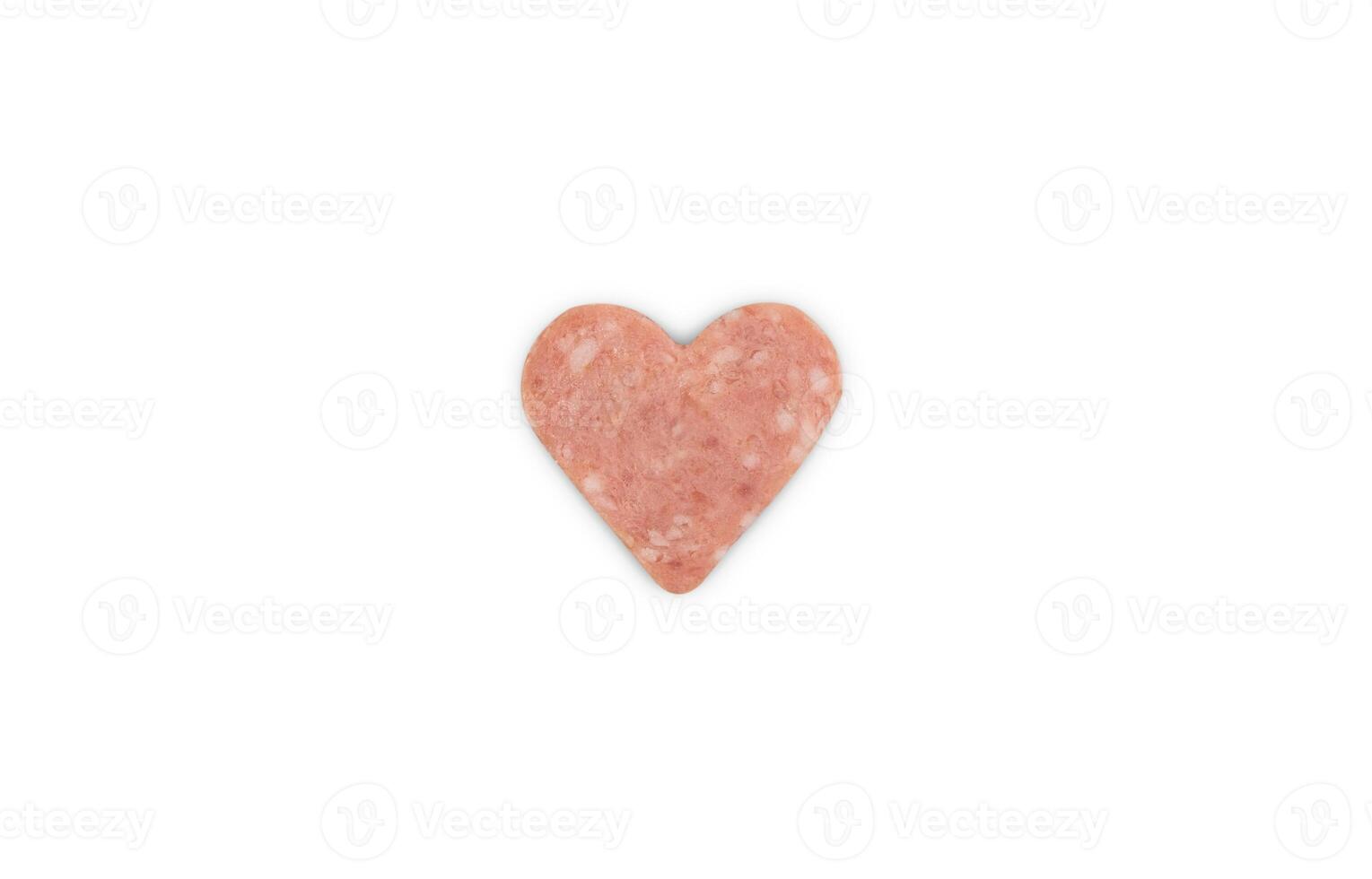 Creative composition for Valentine's Day with slice of sausage cut in heart shape and isolated on white background. Top view. photo