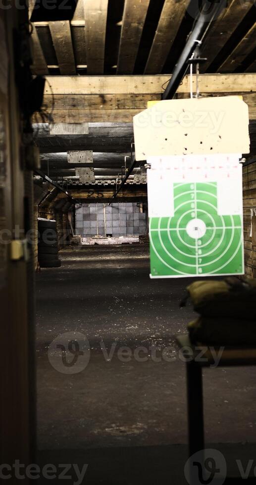 shooting range suspended green target view of a 50-meter underground range. Perfect for capturing the precision and thrill of shooting sports enthusiasts looking the depth intensity of target practice photo