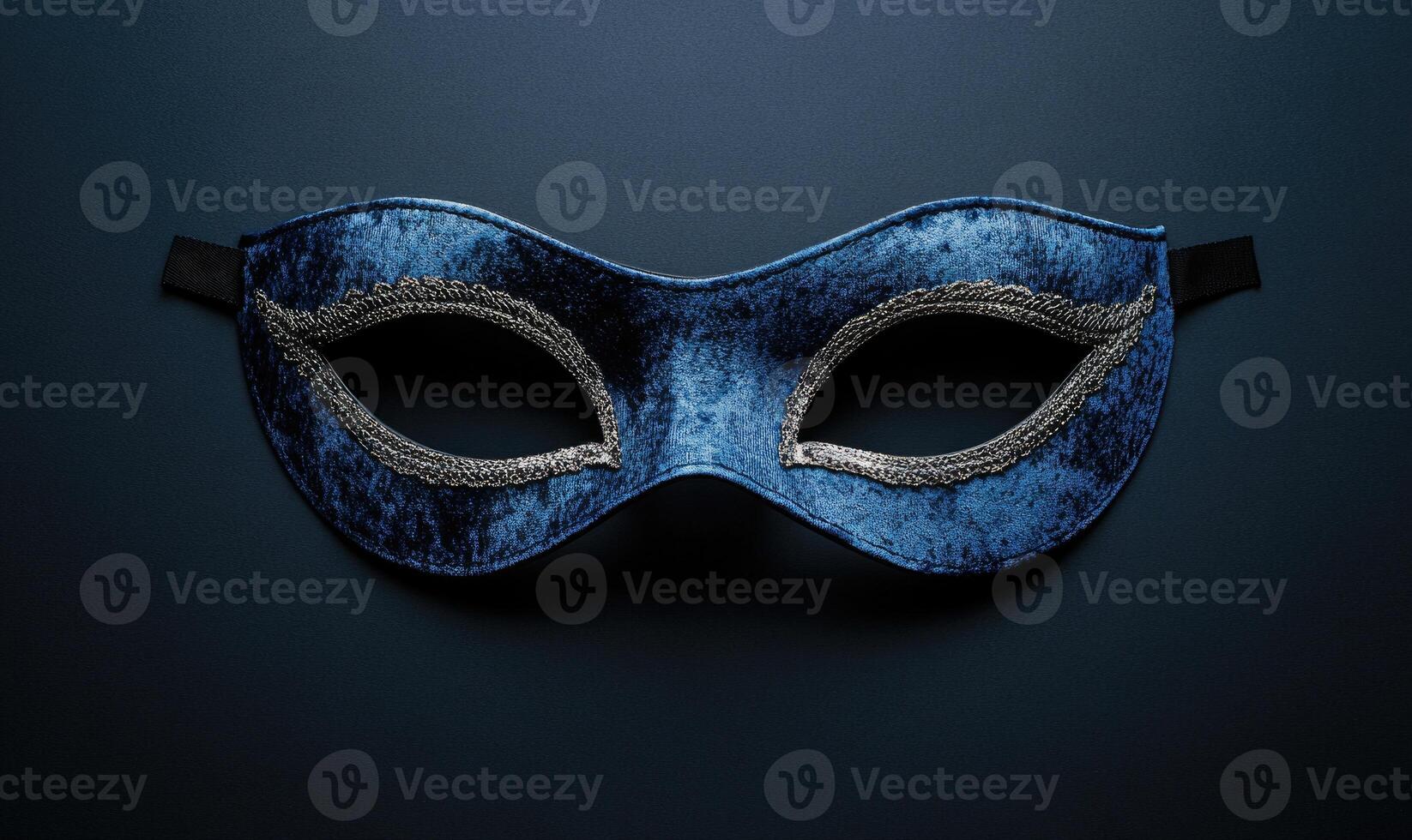 A blue mask with a silver eye photo