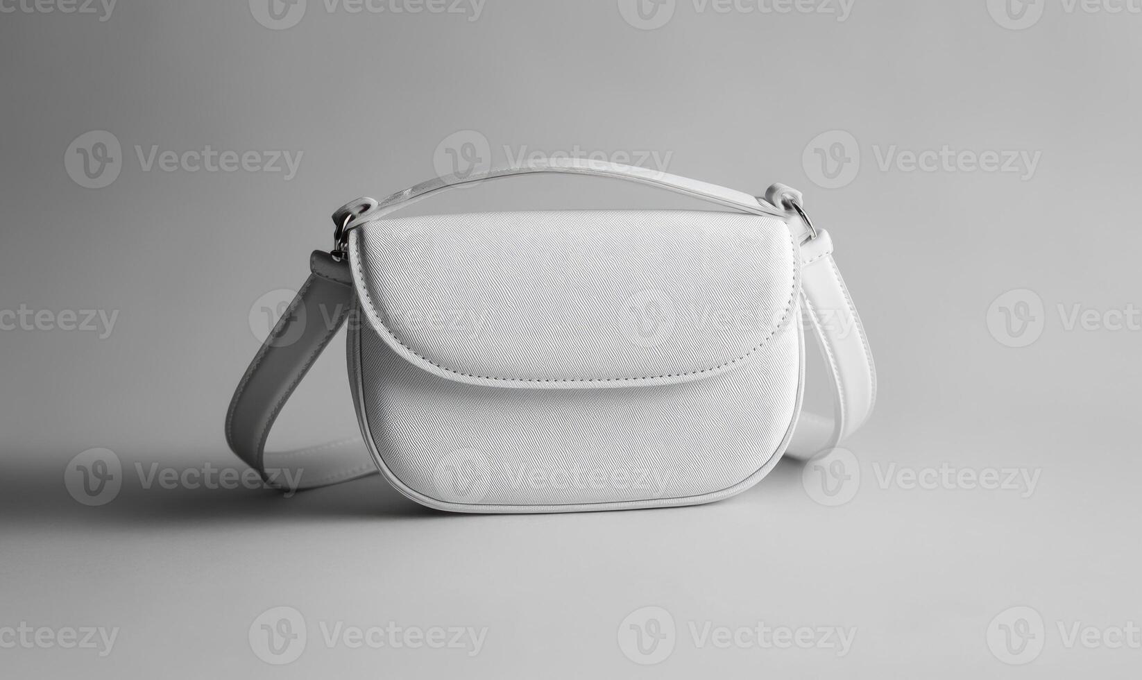 A white purse with a strap photo