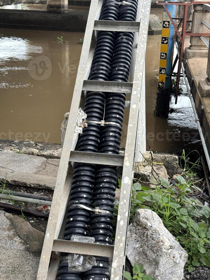 water supply system on the bridge in thailand photo