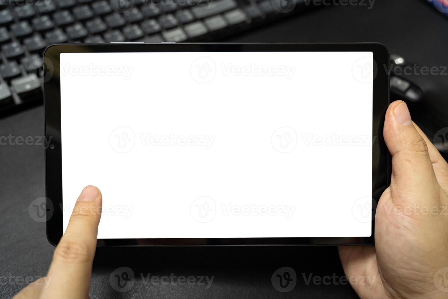 Digital tablet with isolated screen in male hands. digital tablet with empty display. photo
