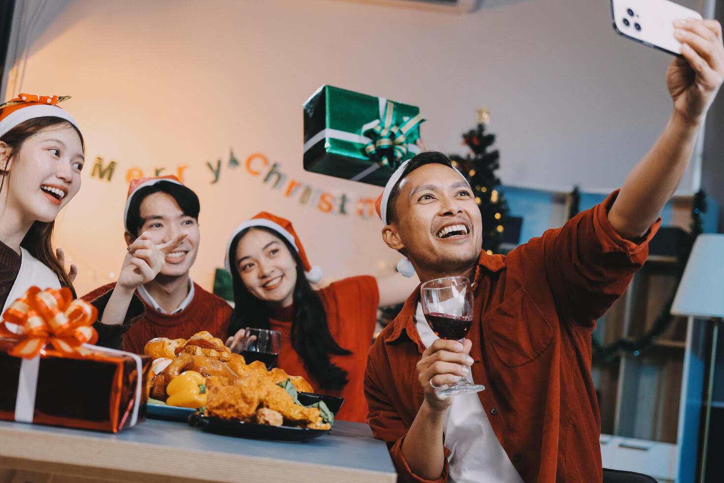 Asian family having christmas dinner together photo