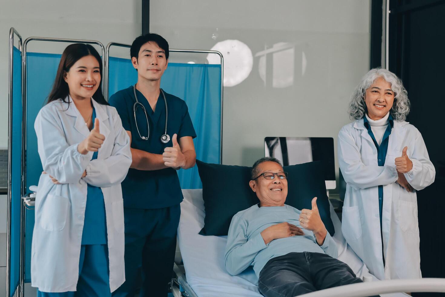 A group of doctors and nurses standing in front of a patient photo