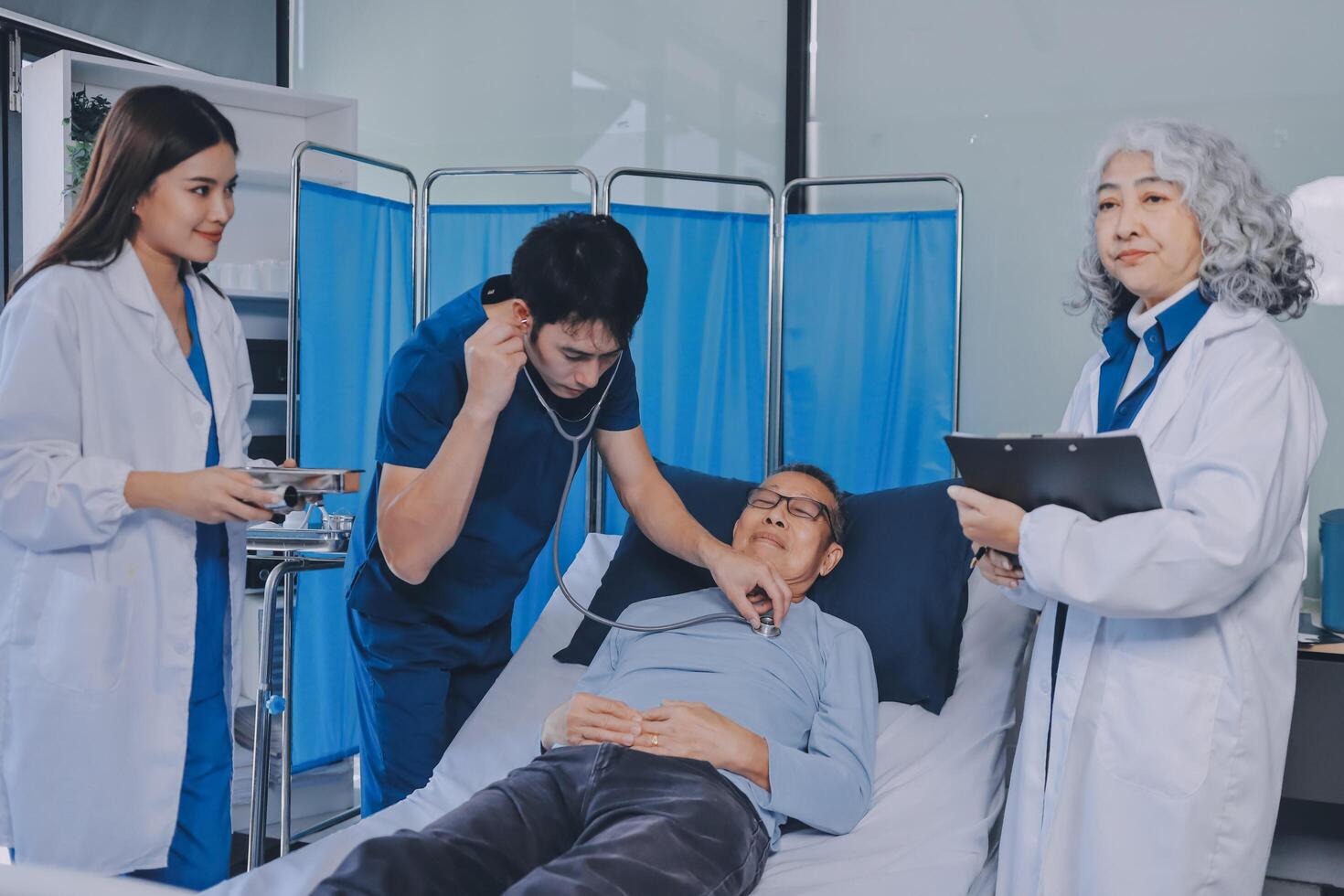 A doctor is checking on a patient in a hospital photo