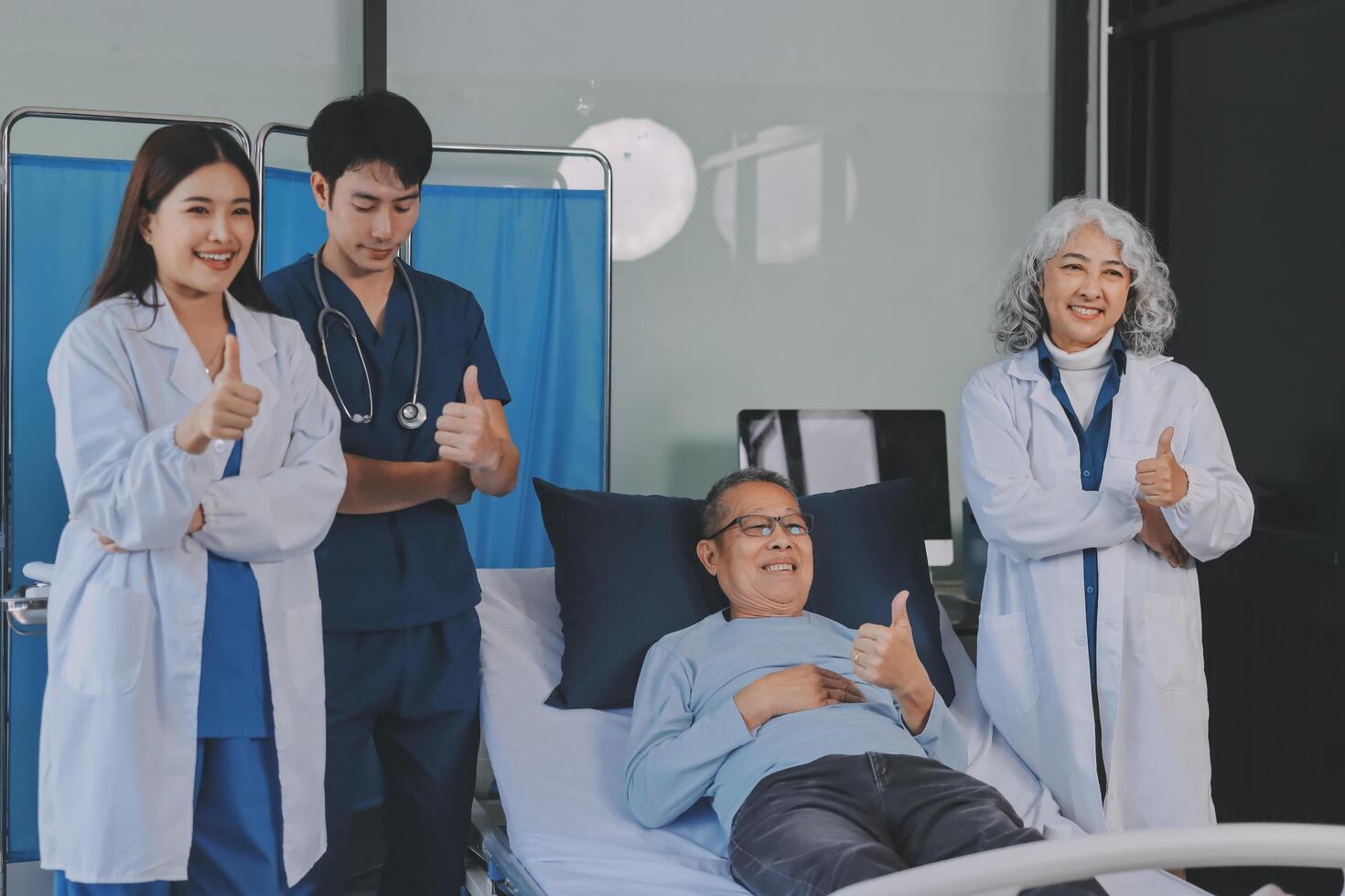 A group of doctors and nurses standing around a patient photo