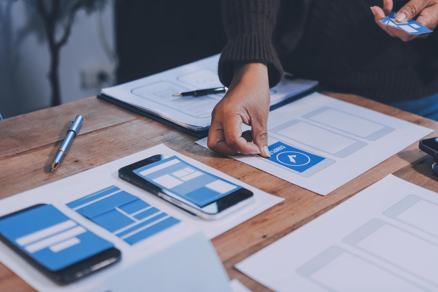 A person working on a mobile app photo
