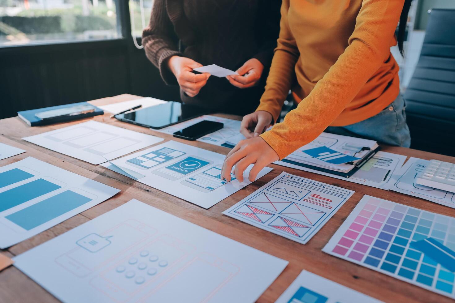 Two people working on a design project photo