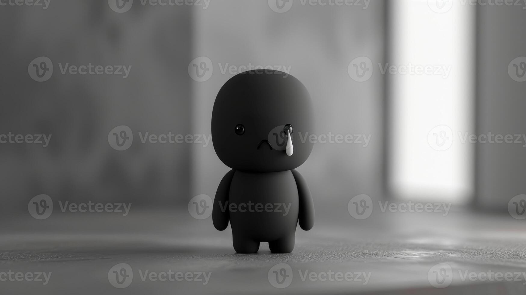 A black and white image of a small toy photo