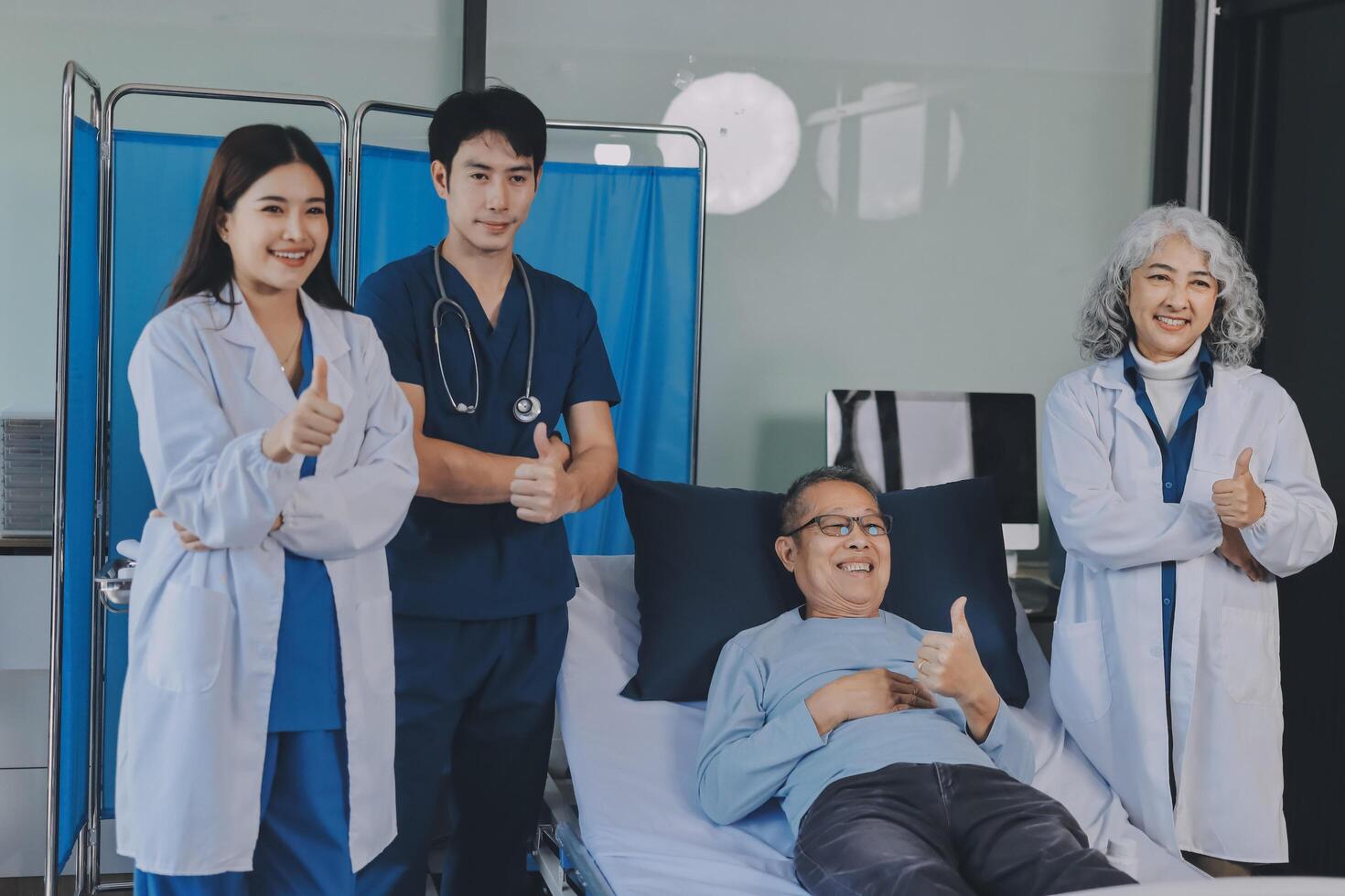A group of doctors and nurses standing in front of a patient photo
