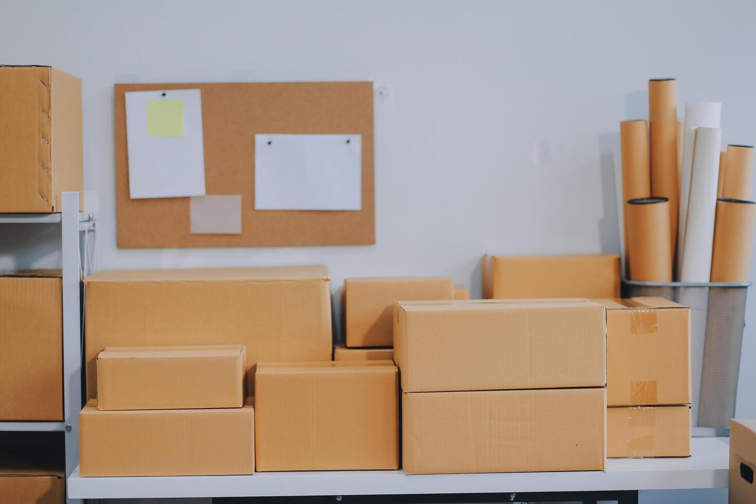 A room with boxes and other items on a shelf photo