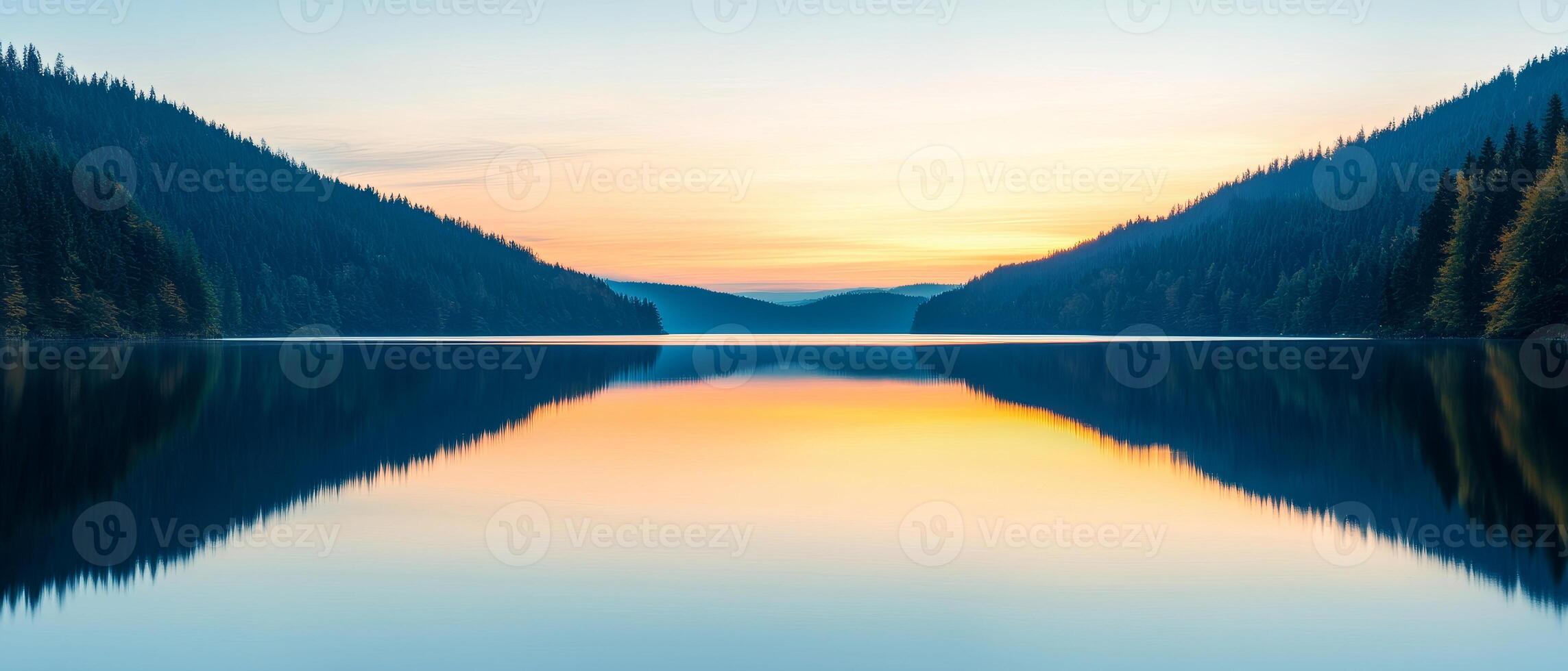 Burnout recovery mental concept. Serene lake reflecting mountains at sunset with calm waters. photo