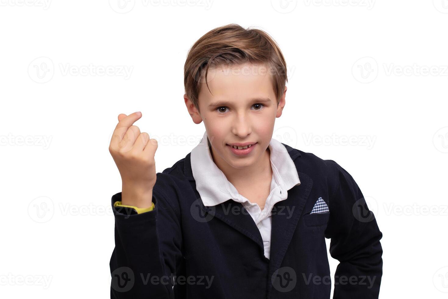Portrait of a cheerful boy, he snaps his finger photo