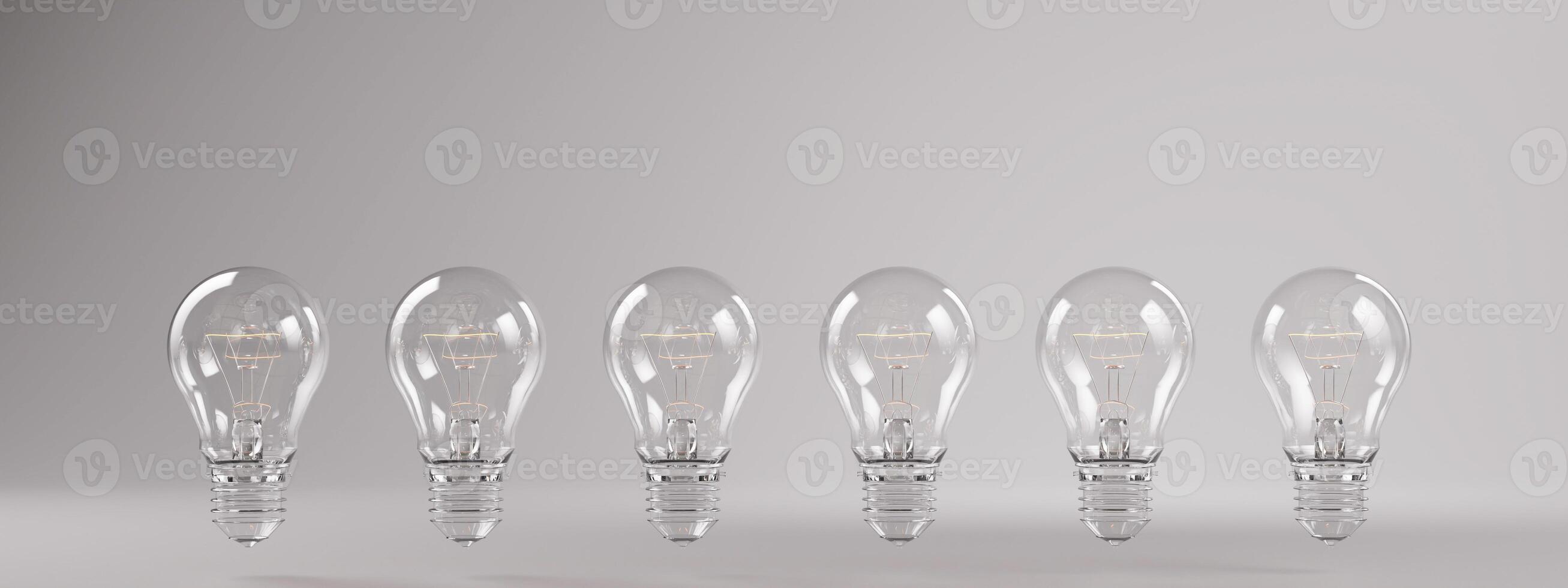Floating Transparent Lightbulbs on Minimalist Grey Background photo